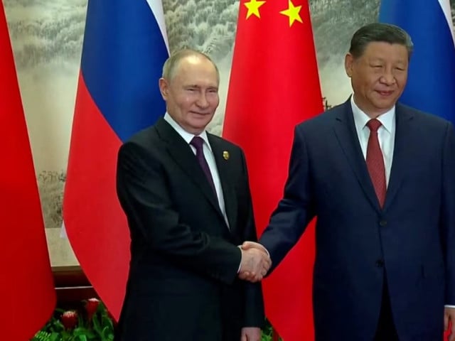 Xi Lauds ChinaRussia Ties As Putin Lands In Beijing 50520